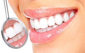close up of a person smiling, illustrating that you get Great Smiles at Grand Avenue Smiles