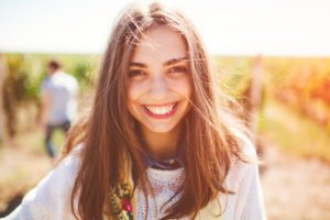Smiling teenage girl outdoors